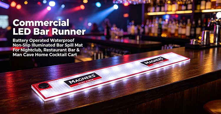 16:9 hero banner of commercial LED bar runner with Magners Irish Cider glowing logo laid on dark wooden nightclub bar counter under colorful party neon lights, battery operated waterproof non-slip illuminated bar spill mat for venue & home bar decor