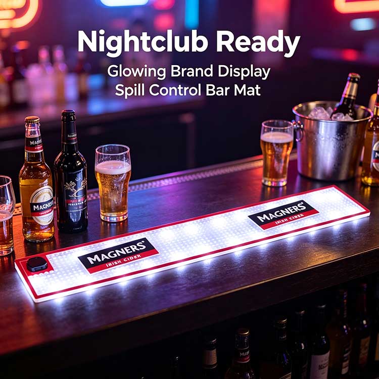 Battery powered waterproof LED bar runner on dark nightclub bar counter under colorful neon lighting, Magners glowing bar spill mat styled with cider bottles, pint glasses and ice bucket for nightclub commercial use