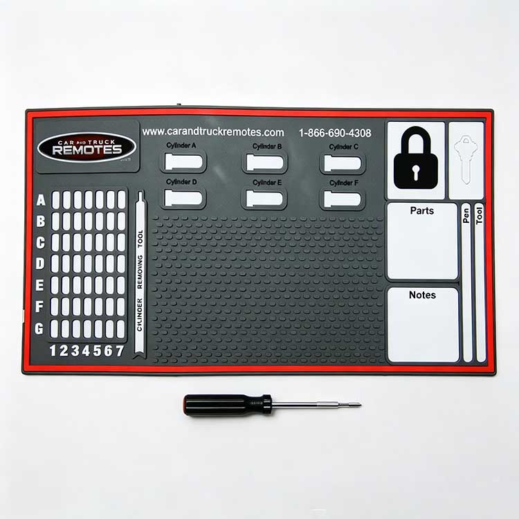 Rubber automotive locksmith tray with Cylinder A-F slots for car lock housings.