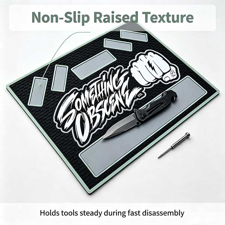 Non-slip raised texture silicone EDC tray holding tools steady during disassembly.