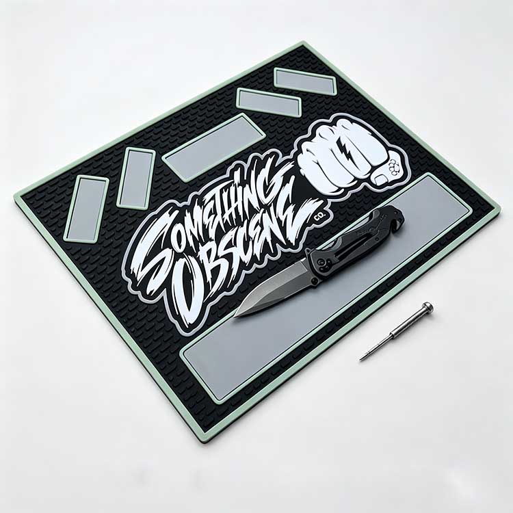 Tactical silicone EDC tray with bold black mint green design and knife.