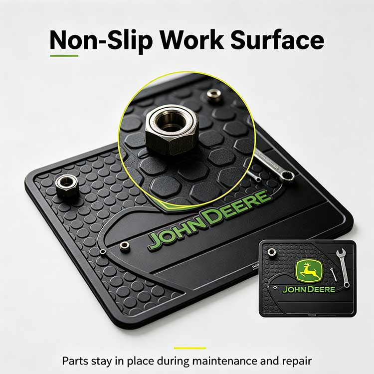 Studded non-slip surface on a maintenance mat holding heavy tractor parts