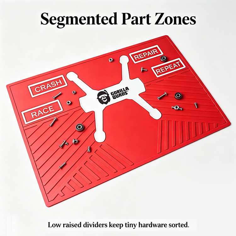 4-zone raised divider design on a tech mat for sorting drone hardware