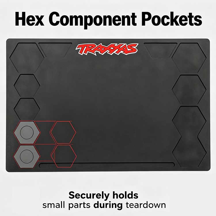 Takedown mat with hex storage pockets holding RC gears and screws.