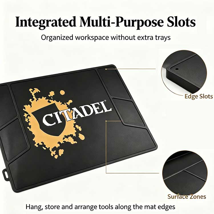 Integrated edge storage slots on workshop mat for organizing model painting tools