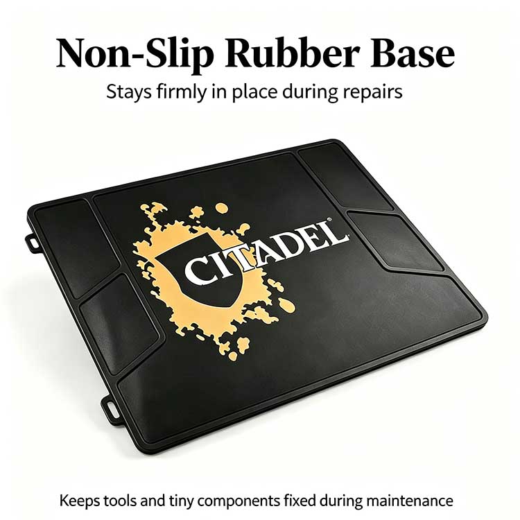 Non-slip rubber base of workshop mat keeping tools and models firmly in place