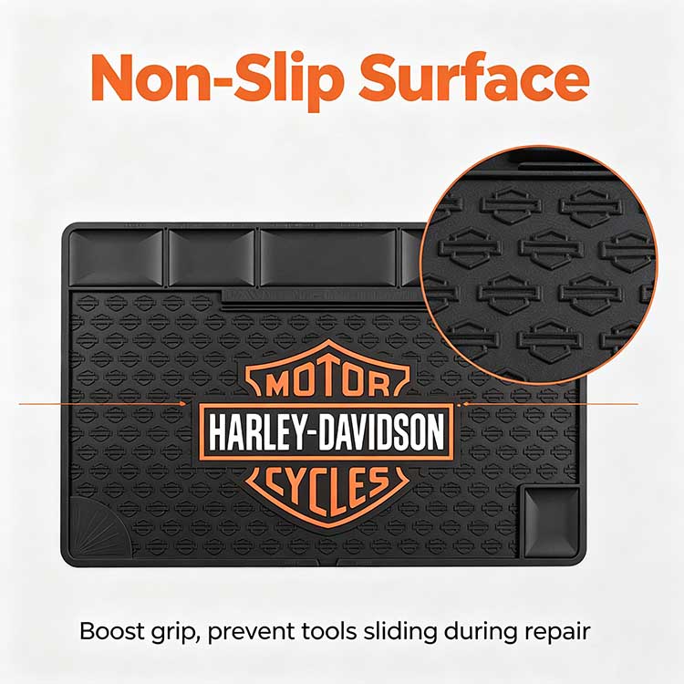 Black rubber utility mat closeup embossed non slip texture prevents tools sliding during motorcycle repair work