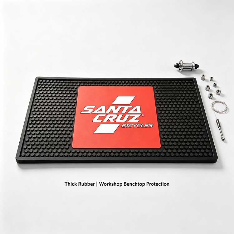 Professional rubber benchtop mat with a large smooth central panel designed for custom brand logos and workshop protection