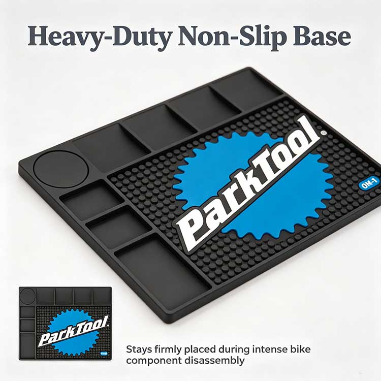 Dense circular studded grip texture on a bicycle tool mat preventing tool sliding.