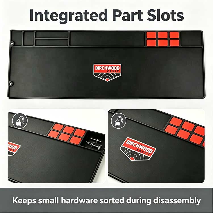 AR-15 cleaning mat with integrated red storage slots for pins and springs.