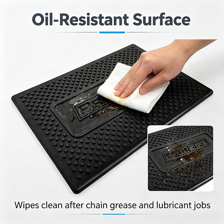 Oil resistant bicycle work mat wiping clean chain grease.