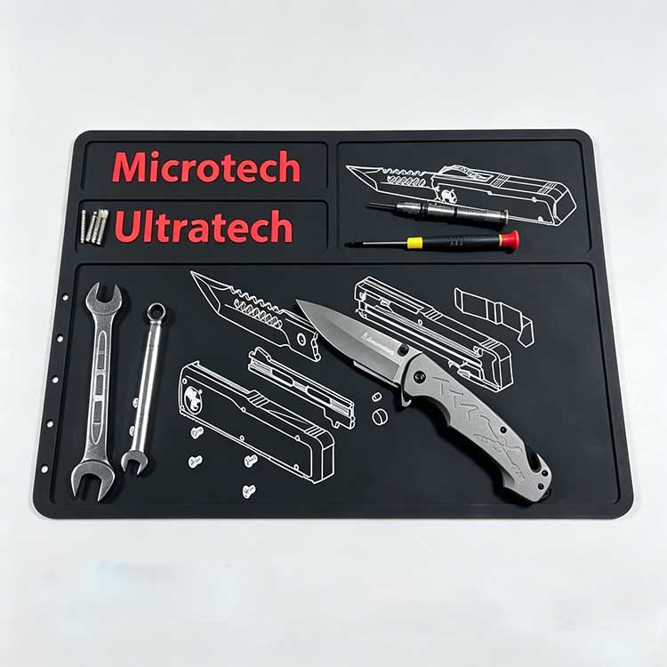 Knife cleaning mat with visual disassembly blueprint and tool alignment slots.