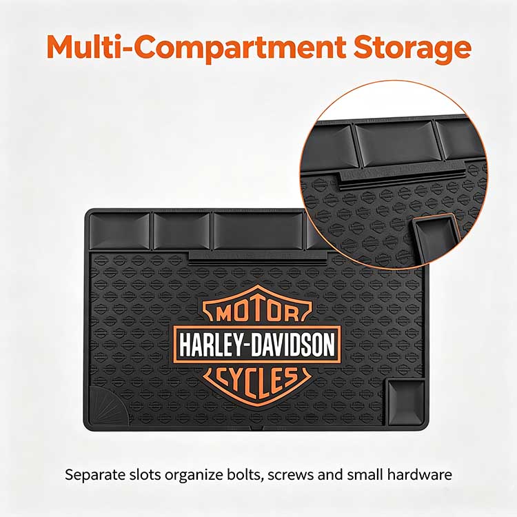 5-slot storage organizer on a motorcycle garage mat holding bolts and nuts