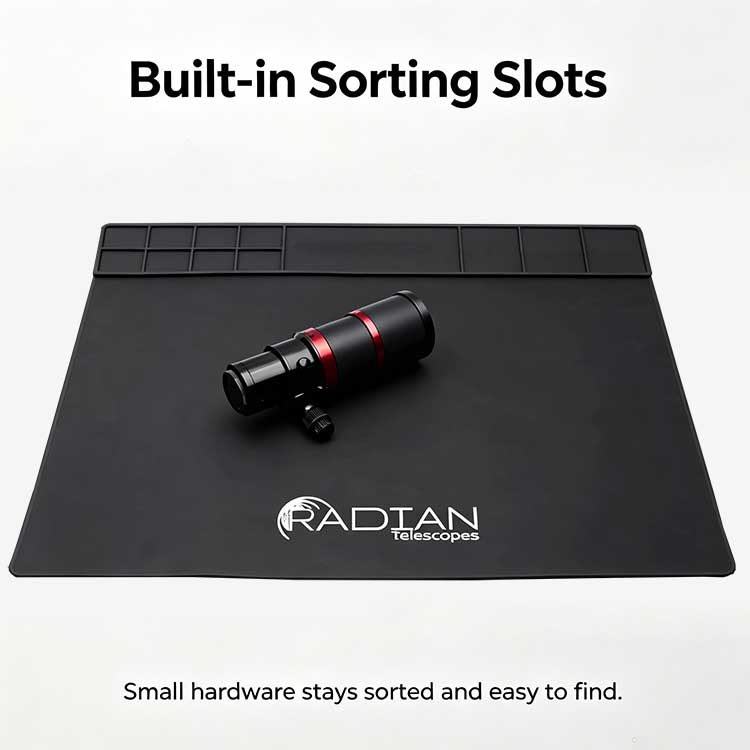 Built-in sorting slots on telescope repair mat keeping small optical hardware secure.