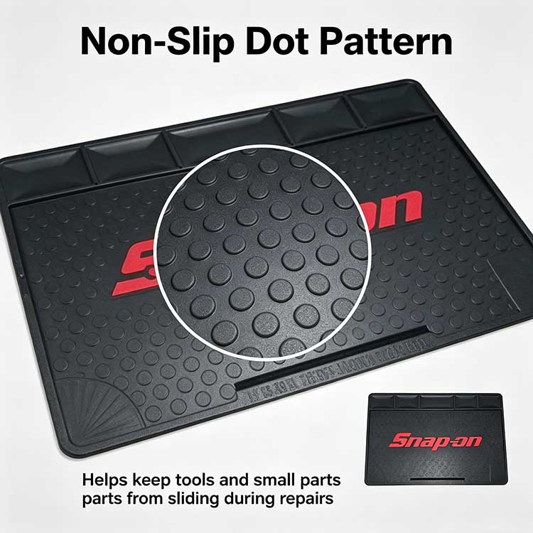 Anti-slip raised dot pattern on a work mat preventing tools from sliding