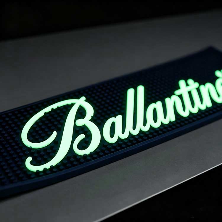 custom-logo-led-bar-mat-glow-in-dark-luminous-brand-display LED glow in dark bar mat with custom luminous brand logo, high visibility illuminated bar runner for cocktail bars, whisky pop-up events and dark lounge counter display