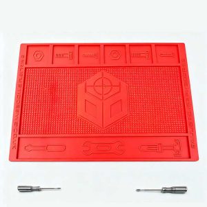 Red rubber tool mat with 6 storage slots and anti-slip dotted grip for workshop organization