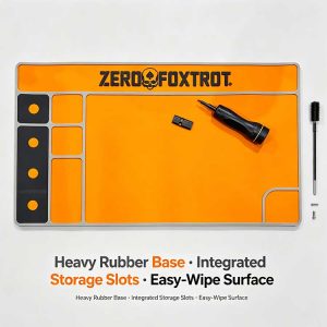 High-visibility orange pistol cleaning mat with black storage slots.