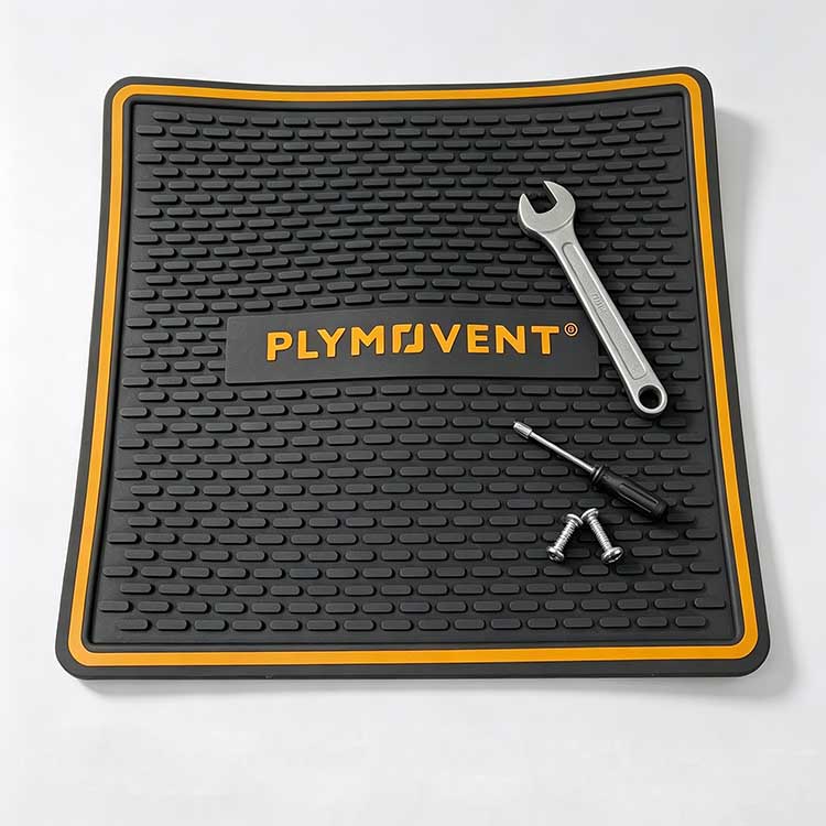 Heavy-Duty Silicone Workbench Mat with Tools Heavy-duty silicone workbench mat with non-slip texture holding wrench screwdriver and screws.