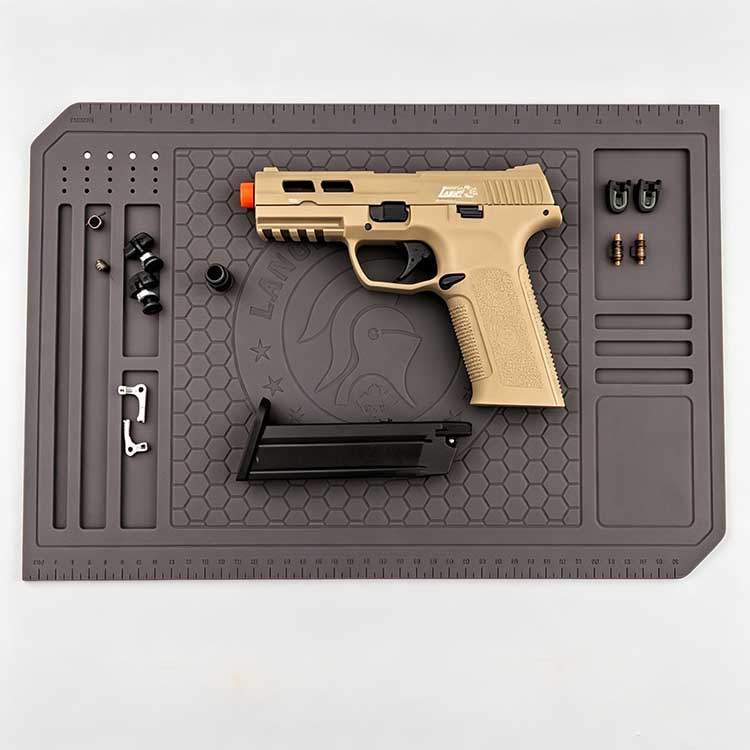 Tactical Silicone Repair Mat with Pistol Layout Tactical silicone repair mat 43.2 x 29.2 cm with honeycomb texture holding a pistol and parts.