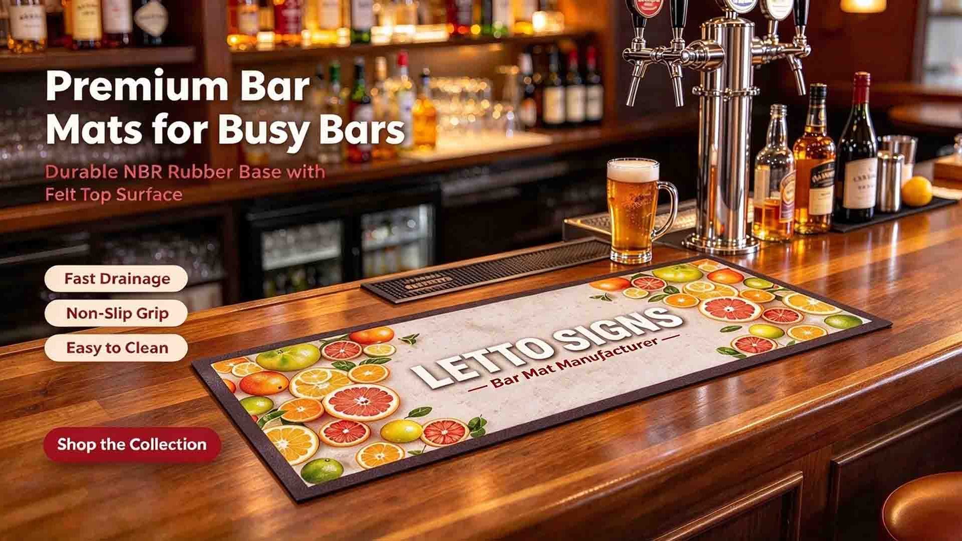 A vibrant fruit-patterned custom bar mat on a wooden pub counter with beer taps, featuring a durable NBR rubber base.